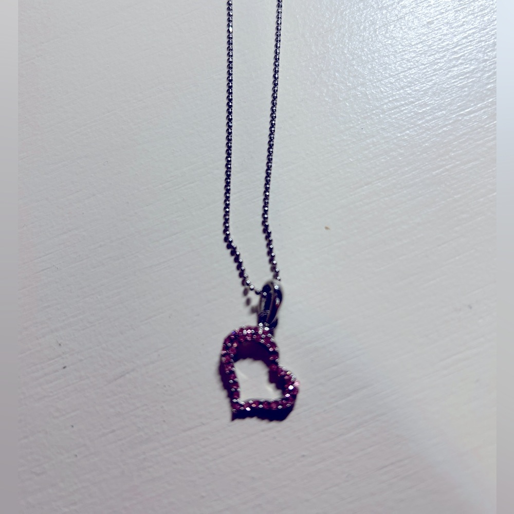 Cute women’s or girls 16” silver necklace with pink heart with pink stones.NWOT